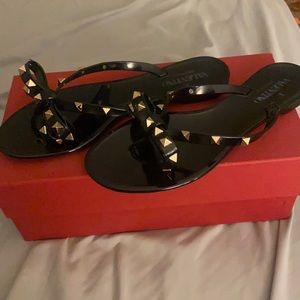 Never worn black and gold Valentino sandals